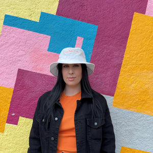 Lucky Bastard Bucket Hat - Cream with Orange Embroidery